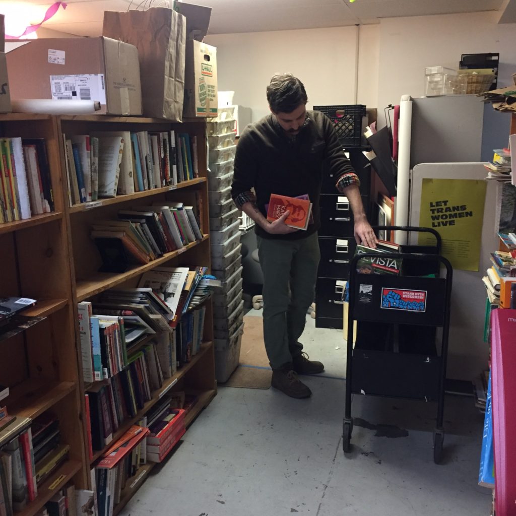 David Clerkin shelving books