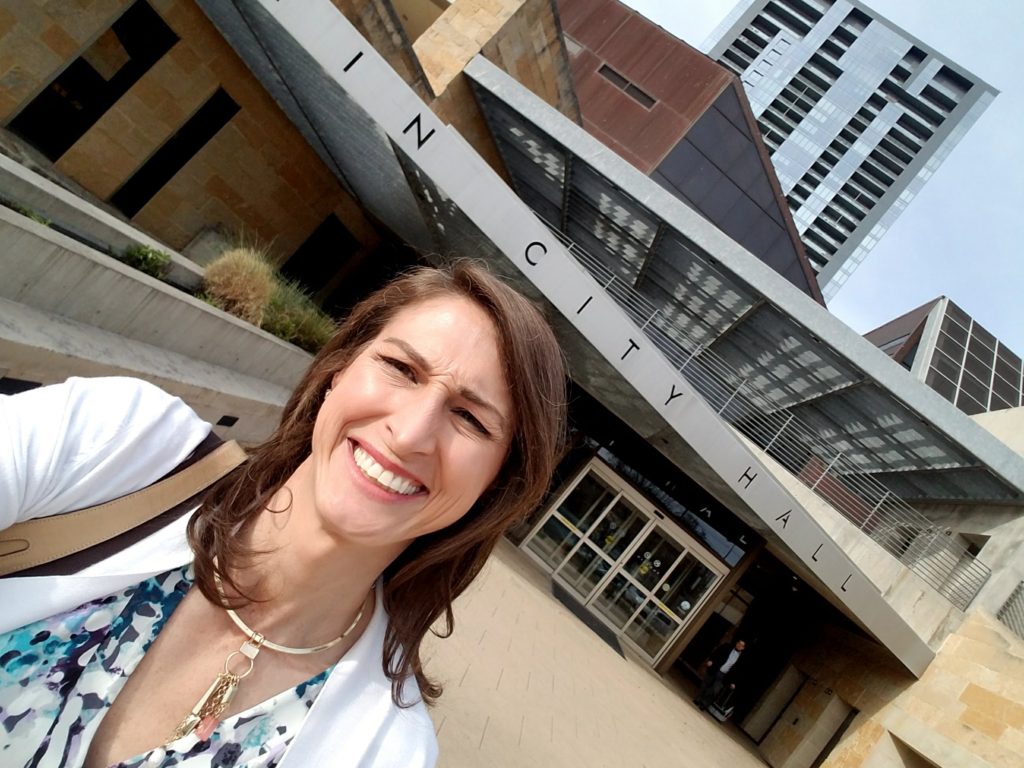 Danielle Skidmore in front of Austin City Hall