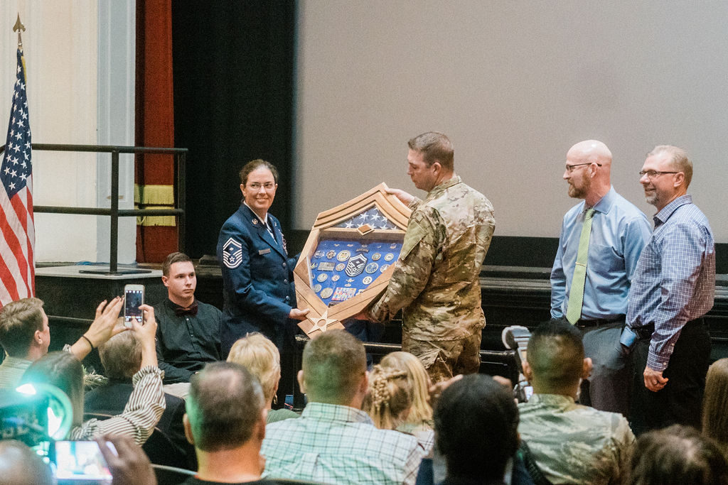 Jenny Thielke, who served during Don't Ask, Don't Tell, at her retirement ceremony