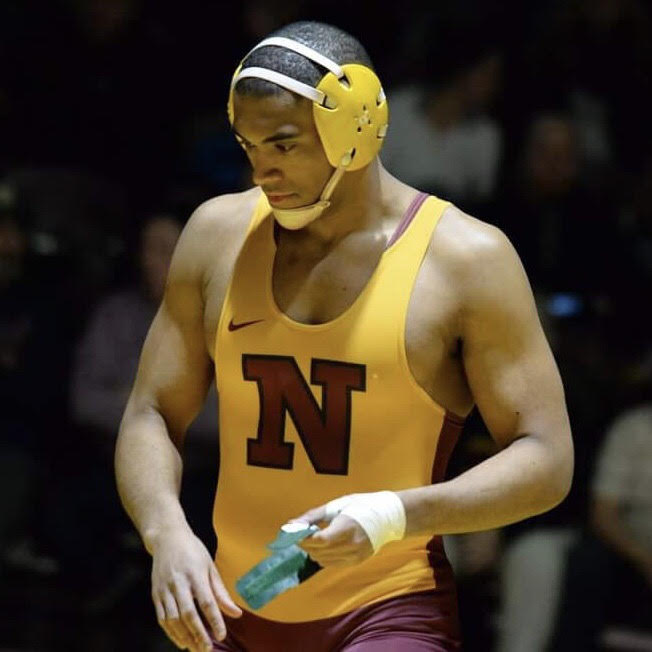 Justice Horn, openly gay college athlete, at a wrestling match in college